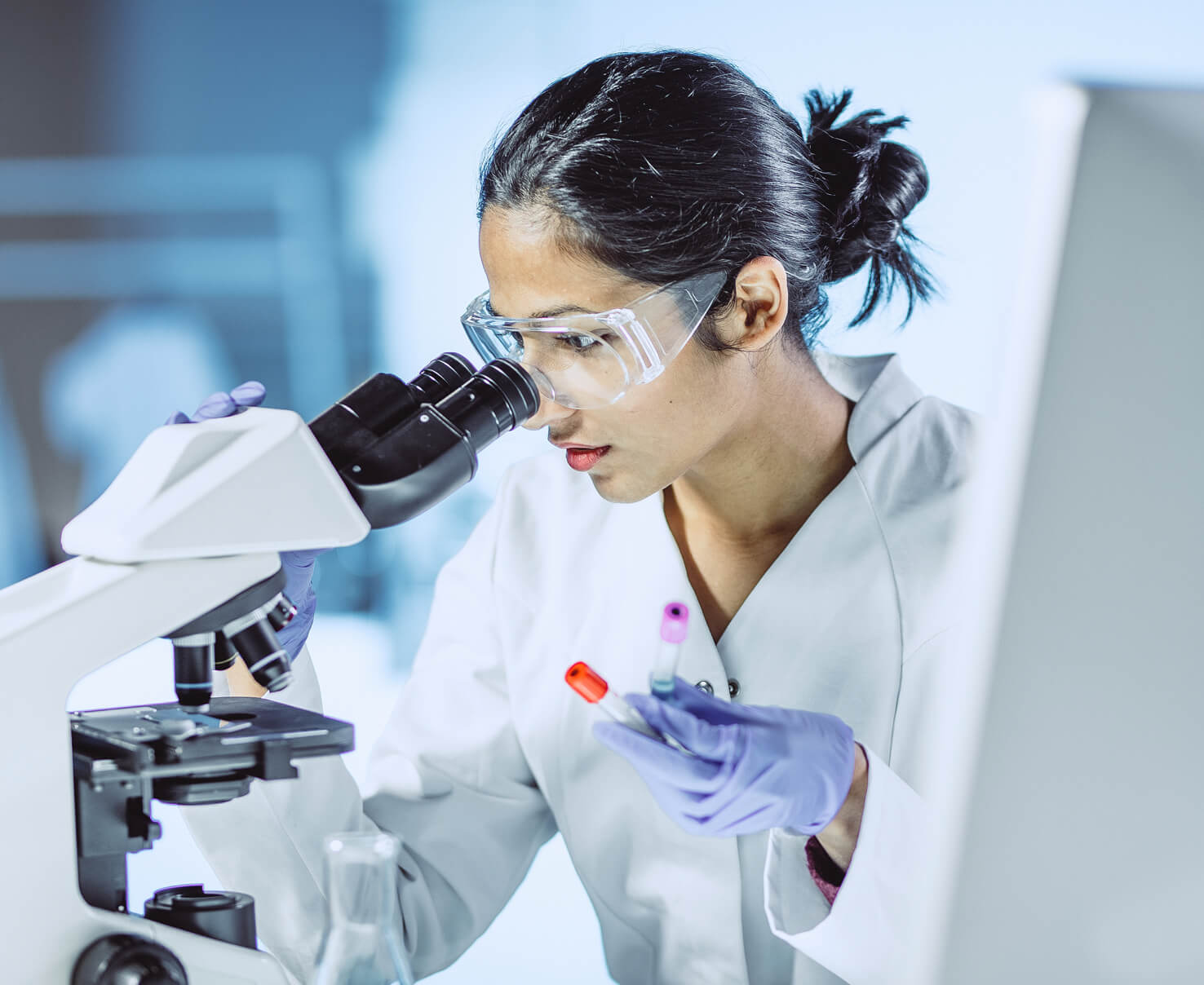 Image of a laboratory worker at Scorpion's biologics contract manufacturing facility in Texas